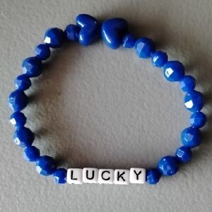 Blue Beaded Bracelet with Heart and Lucky Charm